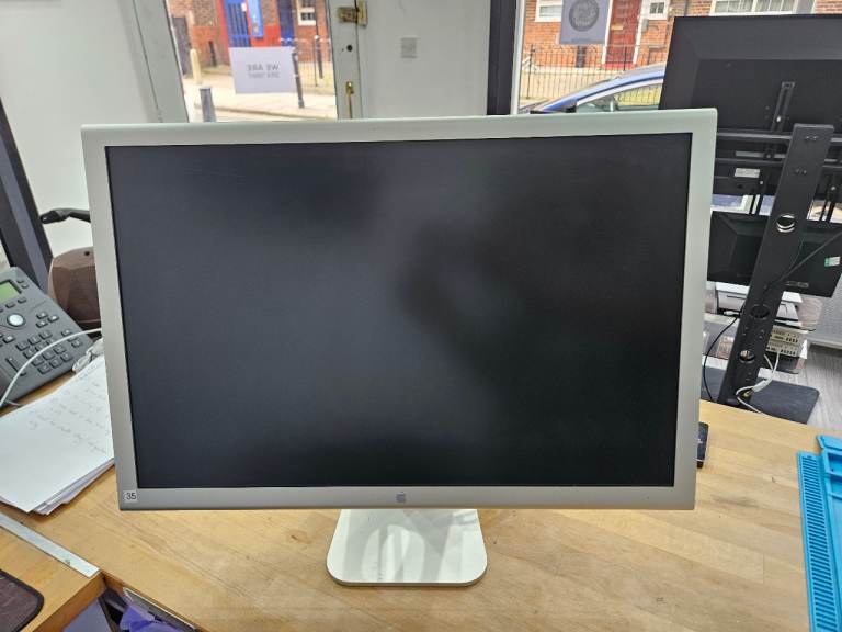 The Apple Cinema Display 23-inch Aluminum, A1082 with 90w power supply
