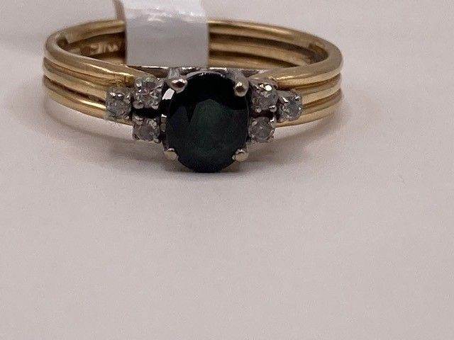 14ct nhm diamond and sapphire ring