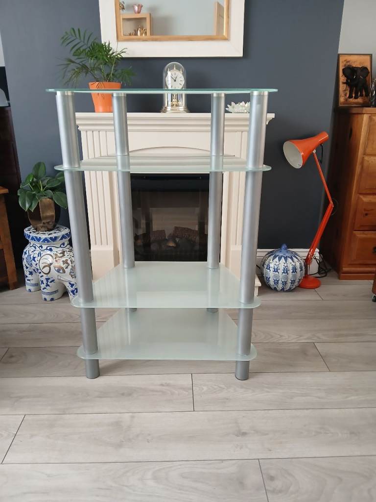 BEAUTIFUL GLASS SHELVING UNIT FOR SALE . COULD DELIVER .