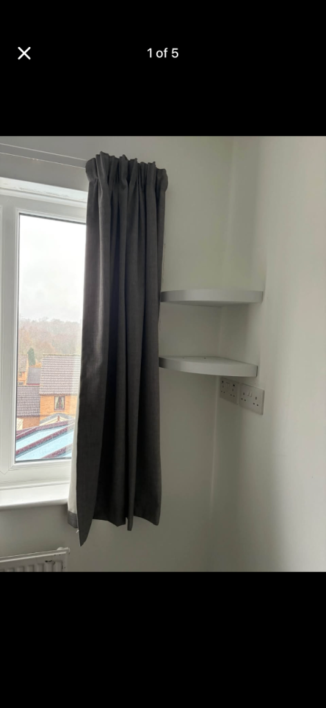 Lined pencil pleat curtains 