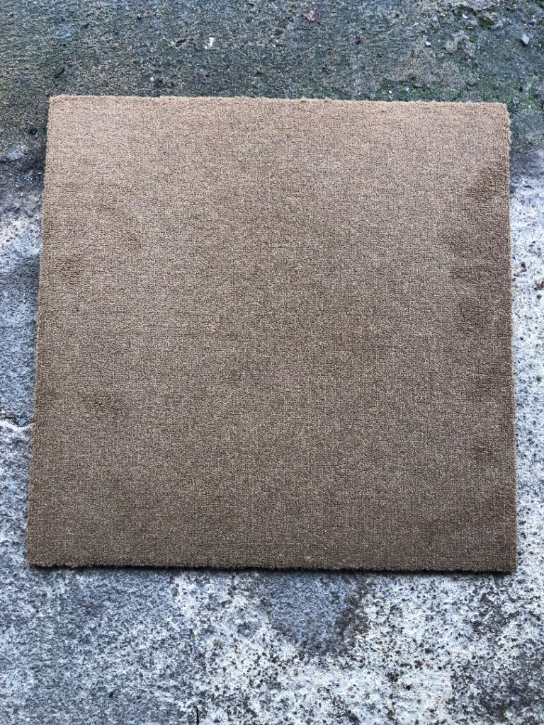 Caramel coloured carpet tiles