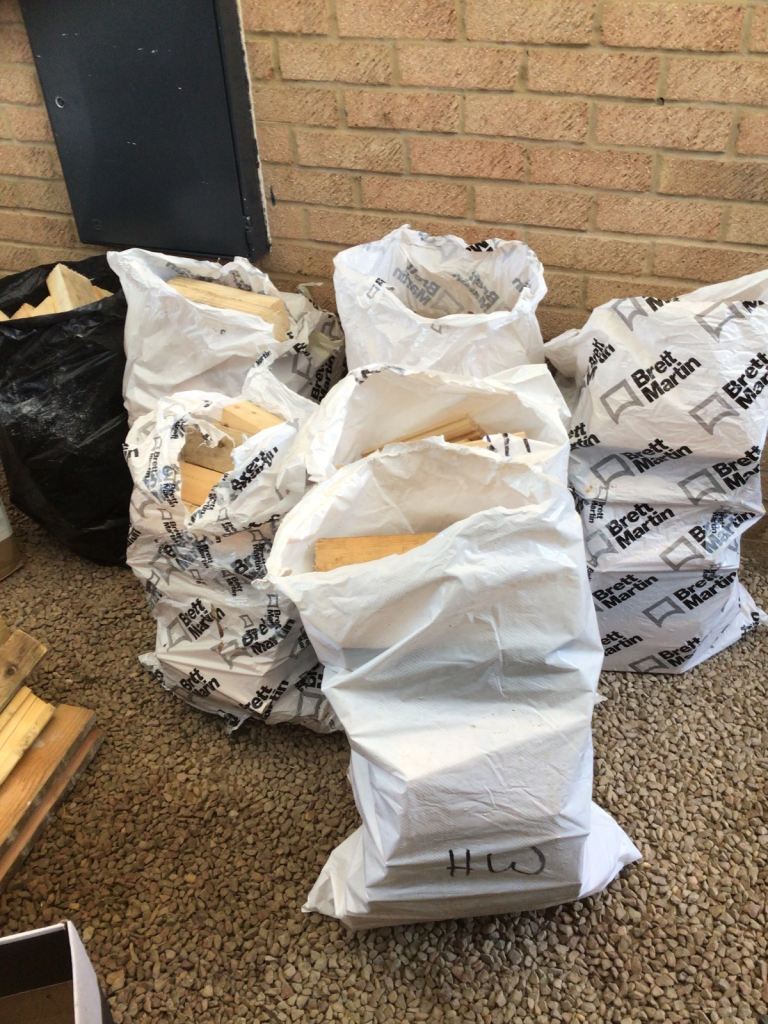 Bags of softwood firewood 
