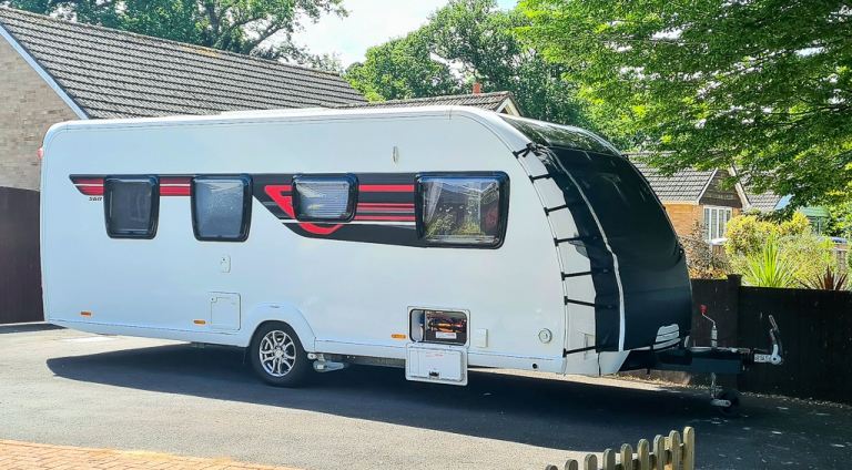 Luxurious 4 Berth 2016 Sterling Elite 560 caravan with lots of extras including 2 tv's &Sun Canopy