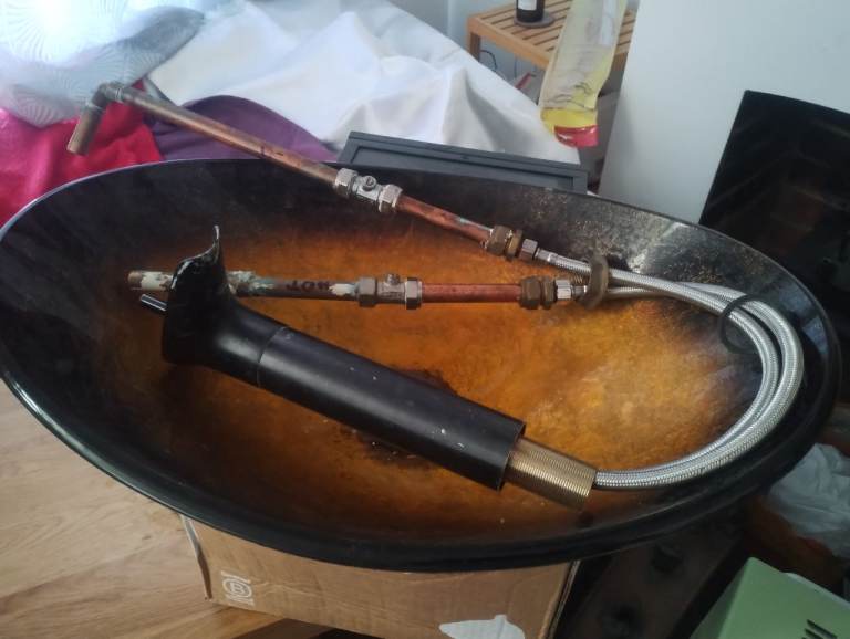 Oval bowl-shaped glass sink and joystick tap