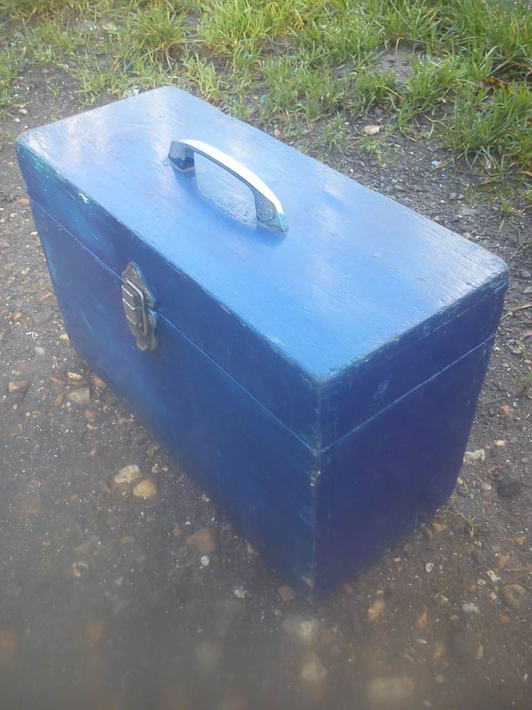 Upcycled, vintage, carrying case, possibly for vinyl records.