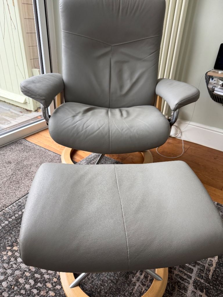 Stressless Leather recliner and footstool 