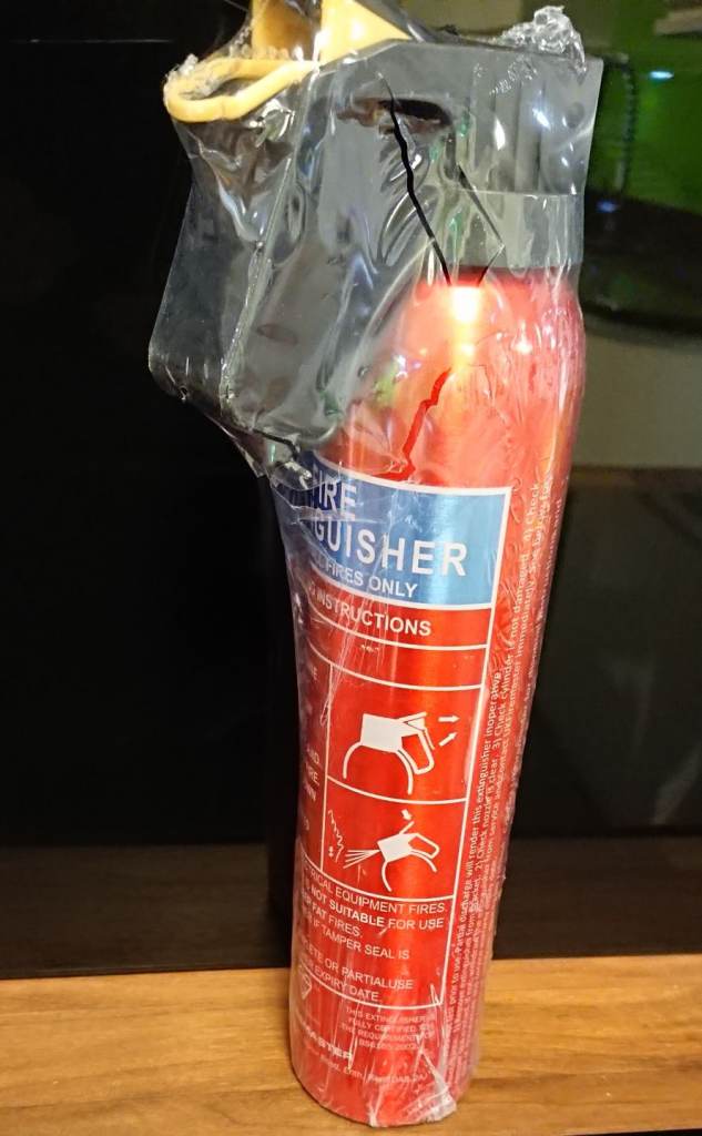 Fire extinguisher new and sealed 