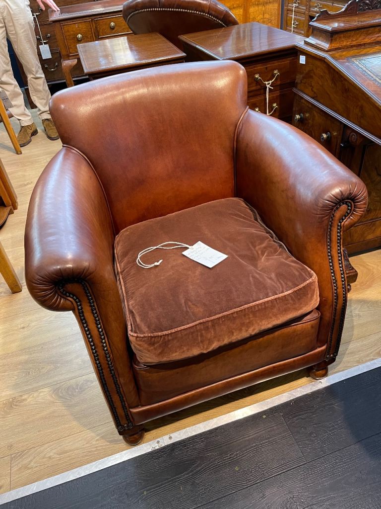 Good vintage leather club chair with a feather cushion