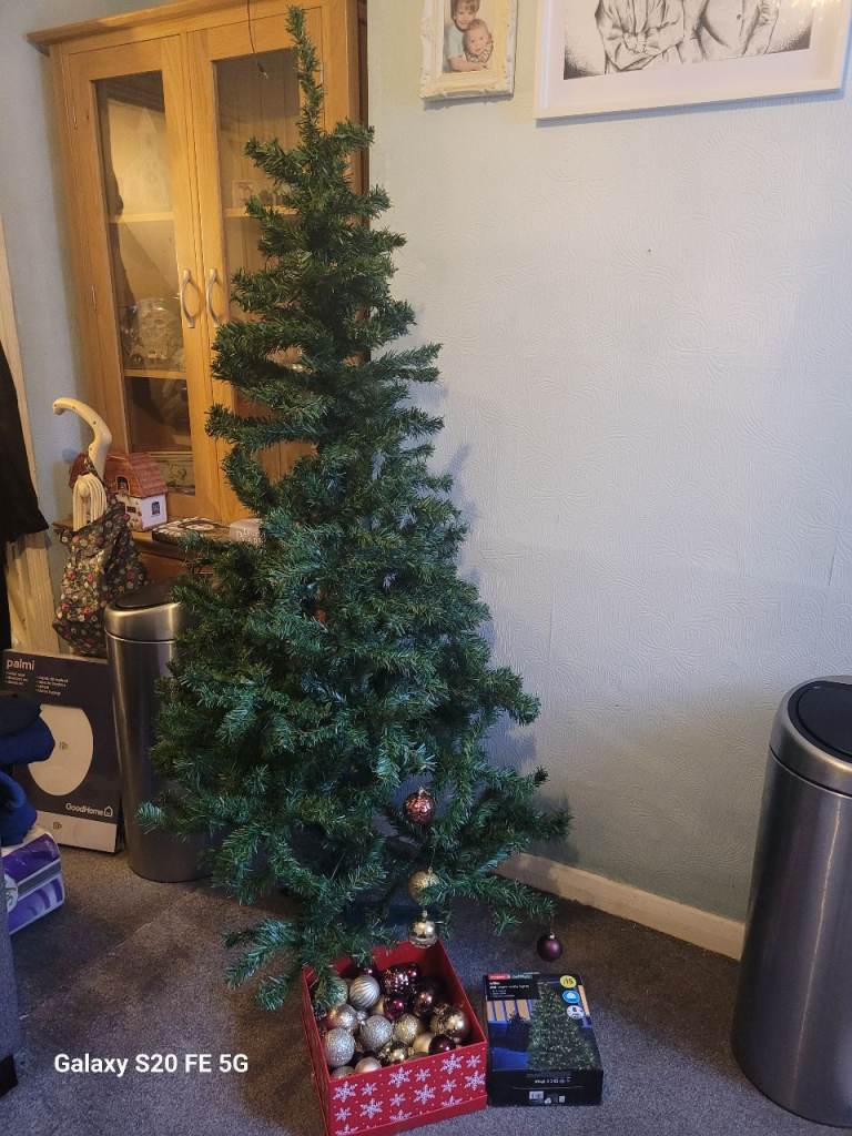 Green 6ft artificial Christmas tree with 300 lights, baubles & stand, delivery available 