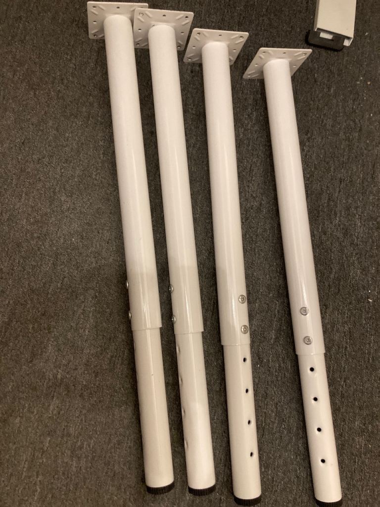 Set of 4 White Adjustable Table Legs – Good Condition