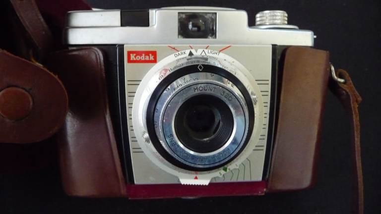 Kodak ‘Coloursnap 35 - film camera together with leather case and strap. 