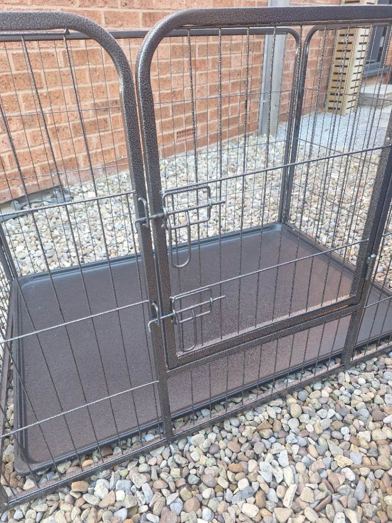 Dog pen with plastic tray