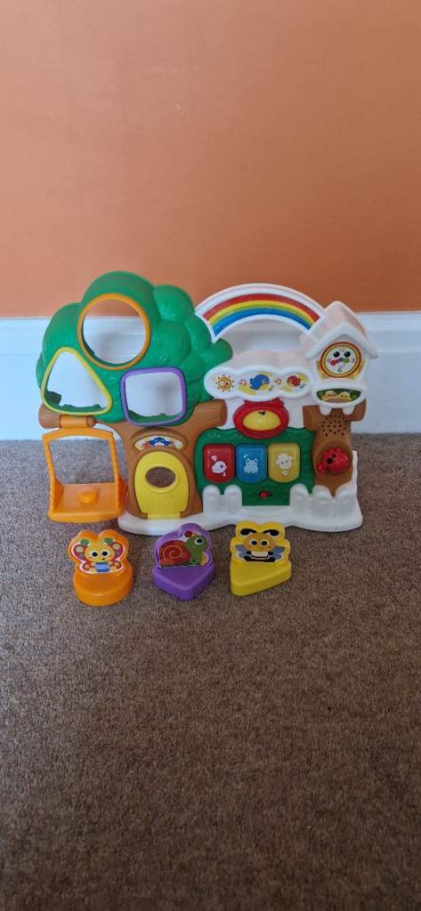 MUSICAL TREE HOUSE AND SHAPE SORTER. INCLUDES BATTERIES. EXCELLENT CONDITION.
