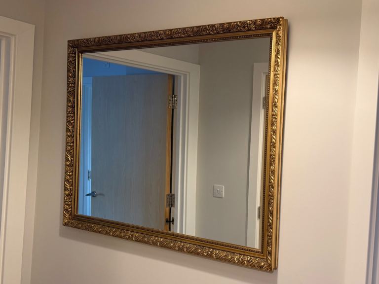 Large antique gold effect ornate mirror