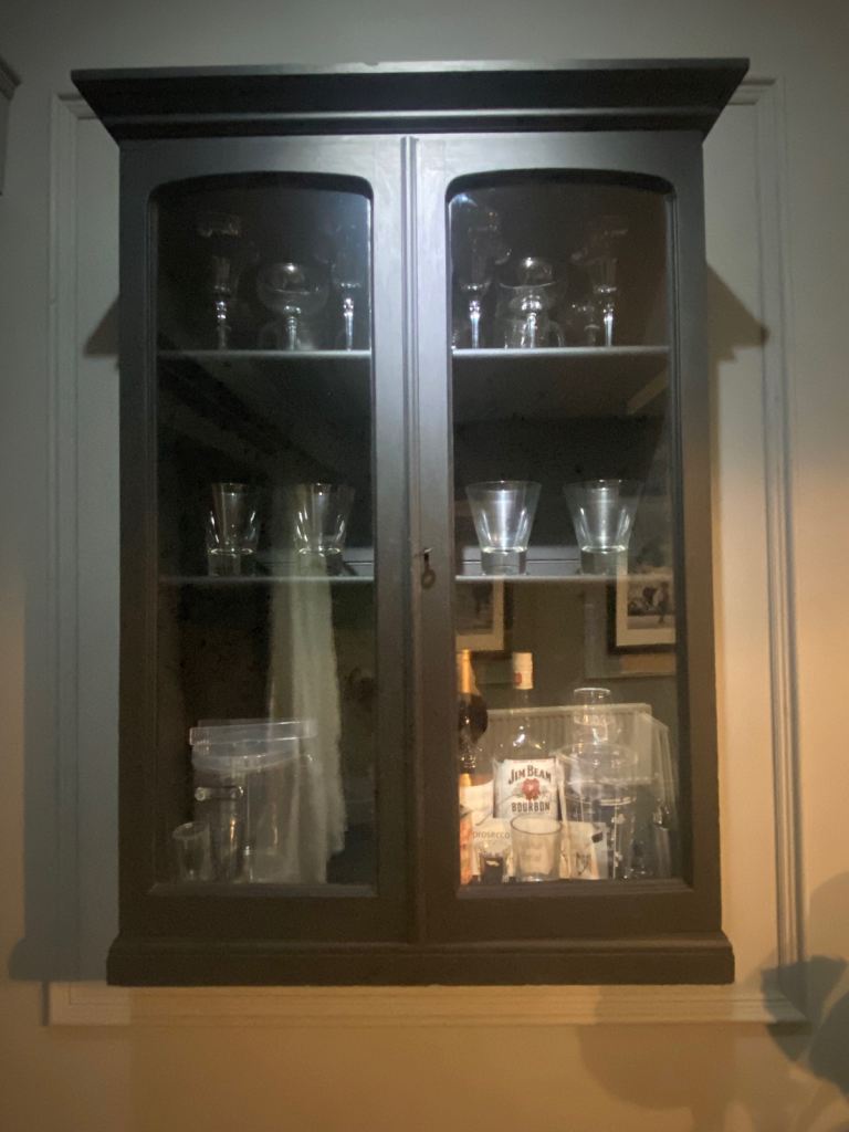 Black wooden and glass wall cabinet 