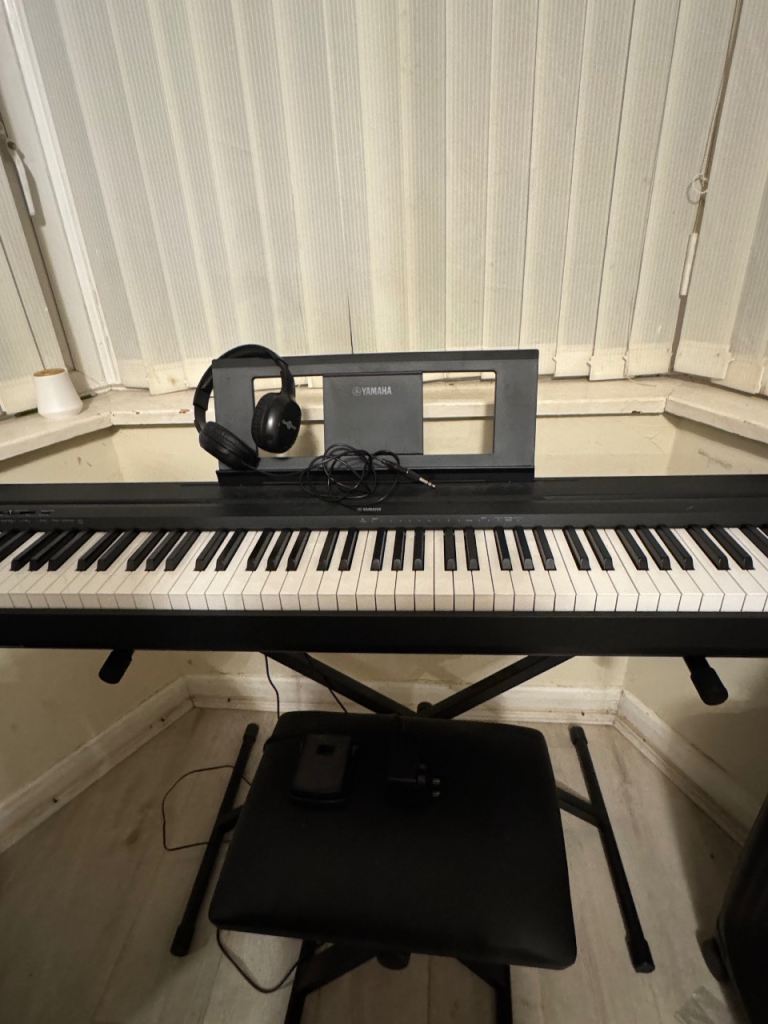 Yamaha piano With stand and stool 