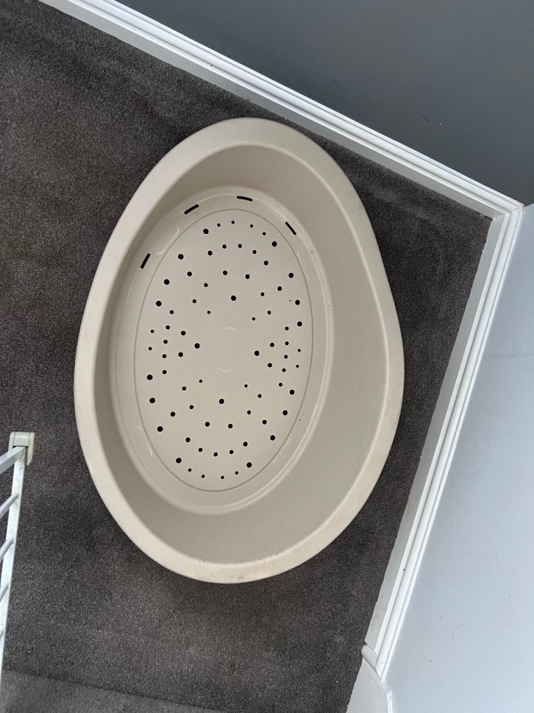 Large plastic dog bed 