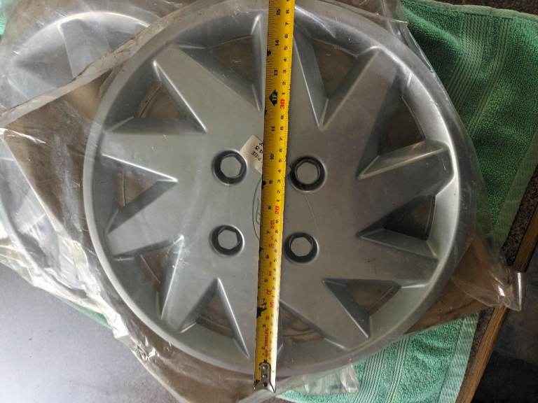 FORD WHEEL TRIMS SIERRA GLS TWO TRIMS