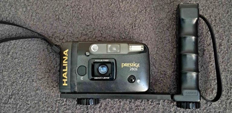 Halina Prestige 280s point and shoot camera. Focus free 28mm wide angle lens automatic flash