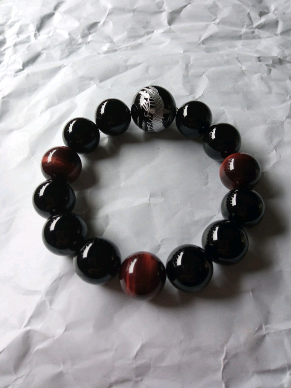 Ladies new in box tiger bangle with silver dragon 