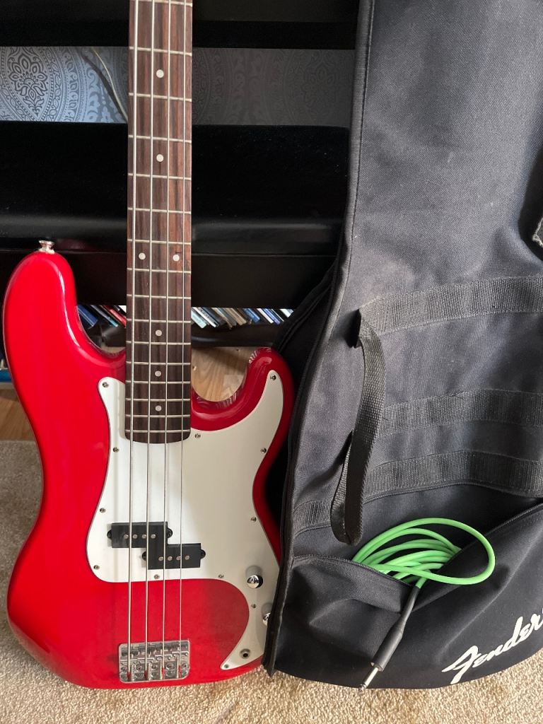 Red Fender Bass Guitar with Soft Case & Lead