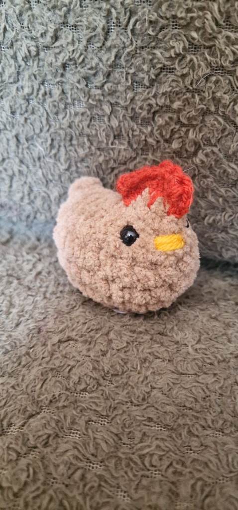 Small handmade crochet chicken
