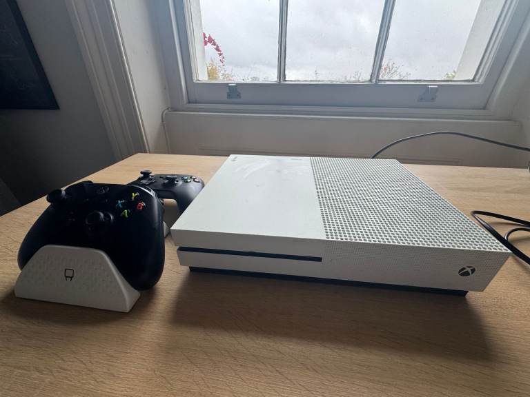 XBox One S with charger dock and 2 remotes
