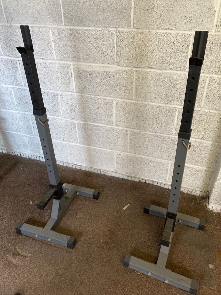 Squat Rack, Lat Pulldown Machine, and Wall-Mounted Pull Up Bar