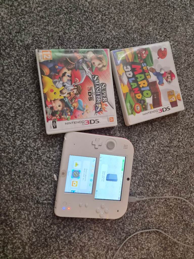 Nintendo 2ds charger and 2 games
