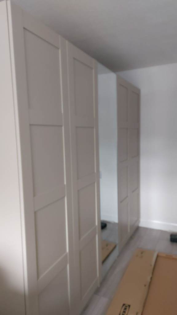 Flatpack wardrobe assembly 
