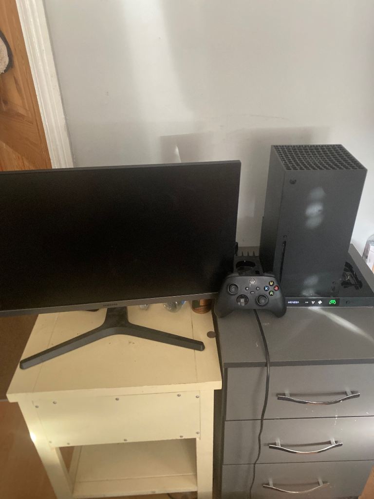 Xbox series x with cooling station and Samsung gaming monitor 