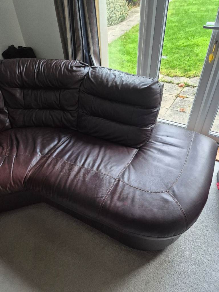 L shaped brown sofa