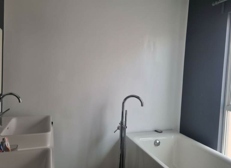 Free standing acrylic bath and tap. Good condition