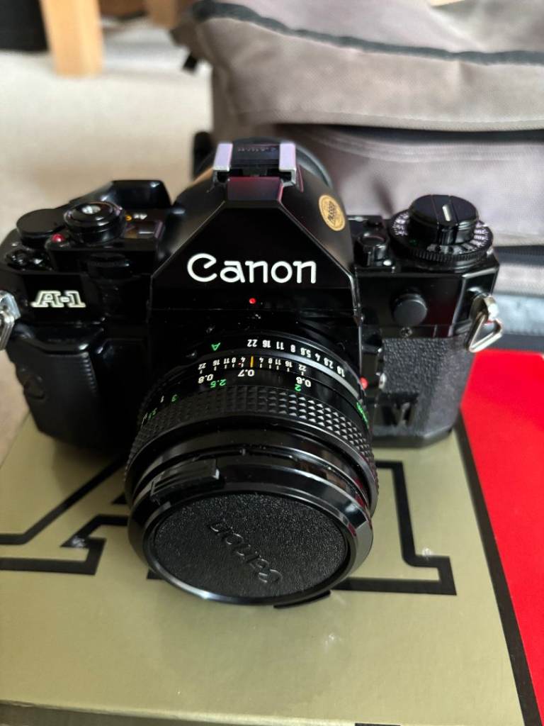 Canon A1 SLR camera 50mm 1.8  Canon lens ,  with 28mm, 13mm  and Zoom   lenses  Pristine condition