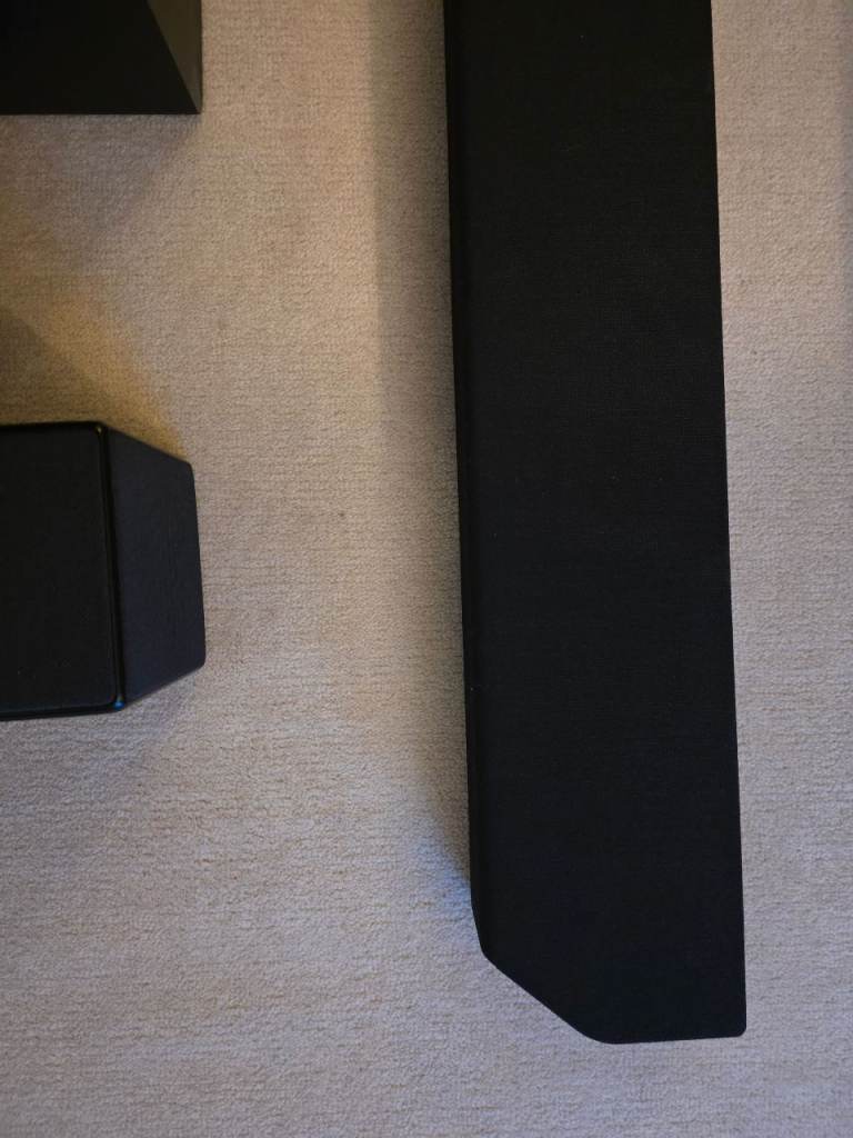 Samsung HW-Q950A soundbar with rear speakers and subwoofer