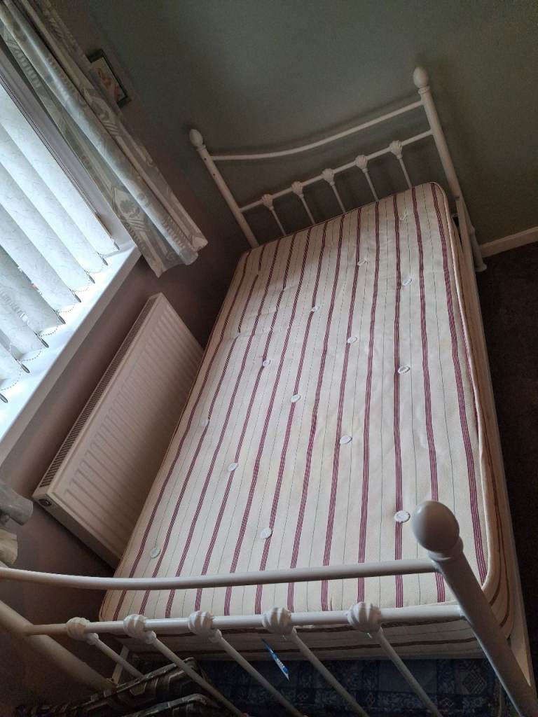 Single bed with a pull out bed