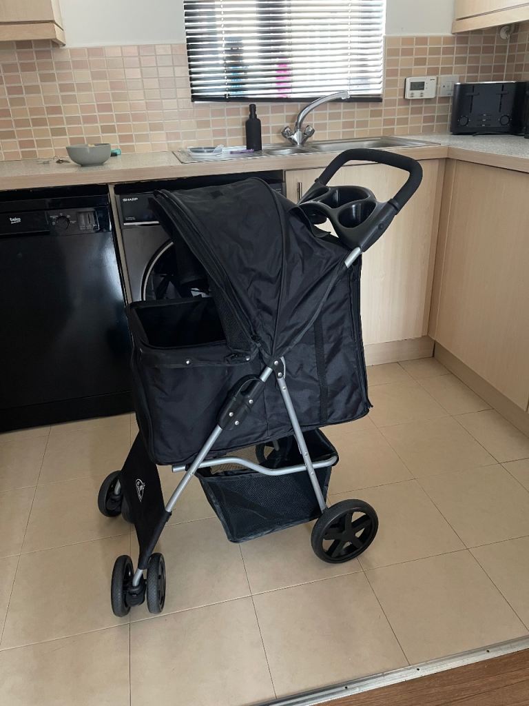 Black dog / puppy pushchair 