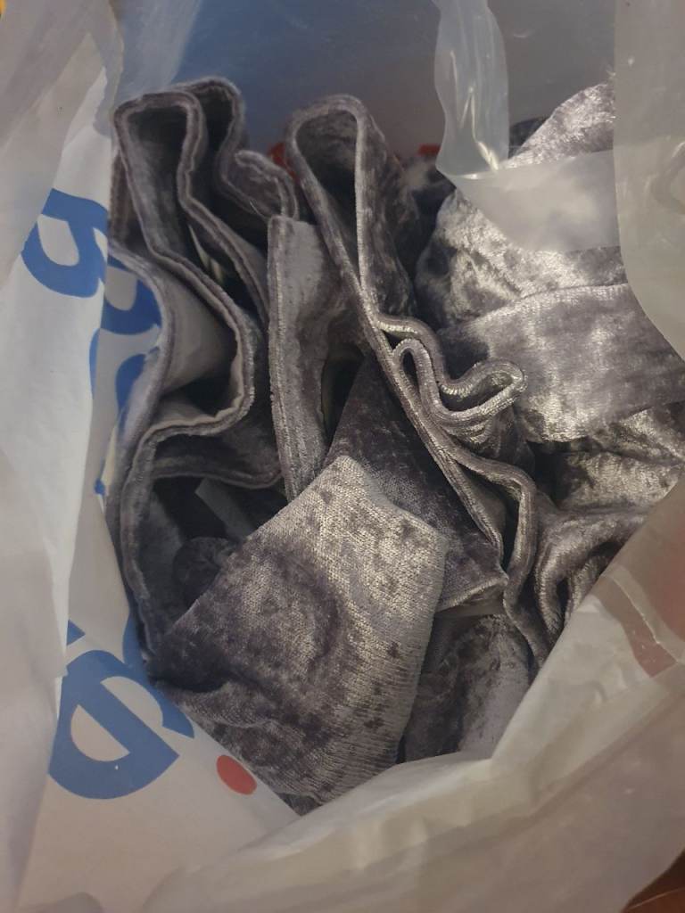 One single grey velour curtain 