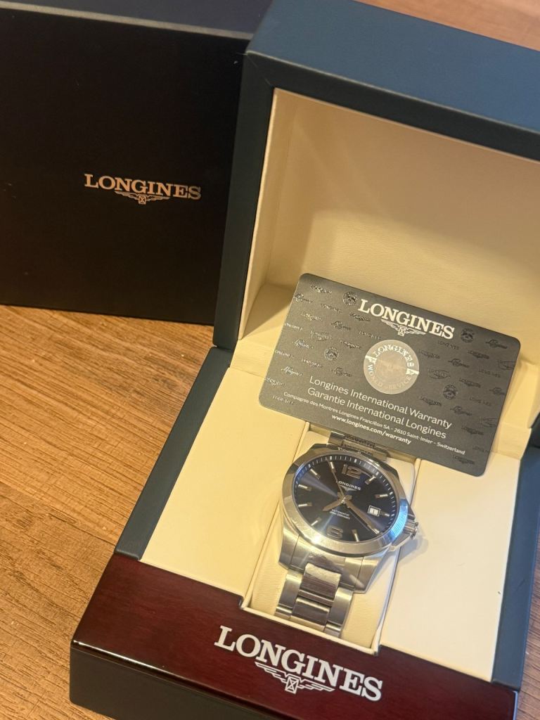 Blue/Silver Longines Conquest Watch