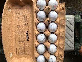 12 Titleist Velocity Golf Balls with marks for £6