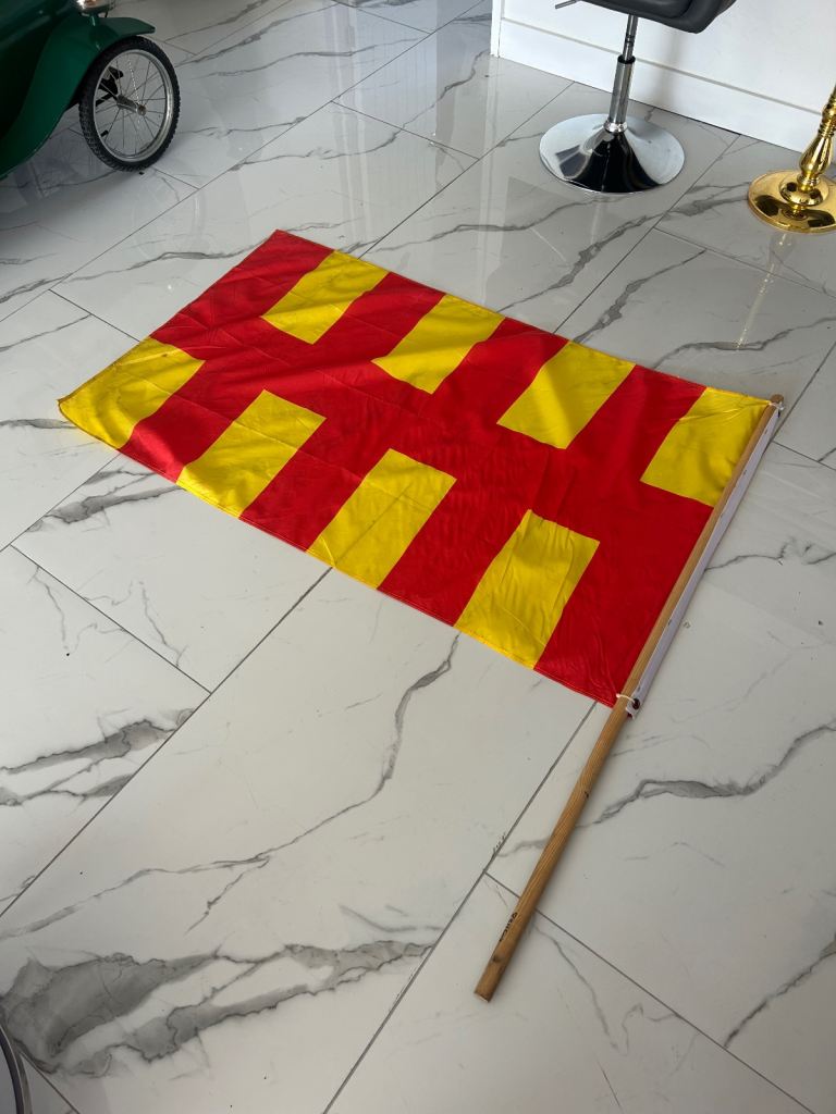 Large Northumberland County Flag – Bold Red & Gold Design on Wooden Pole