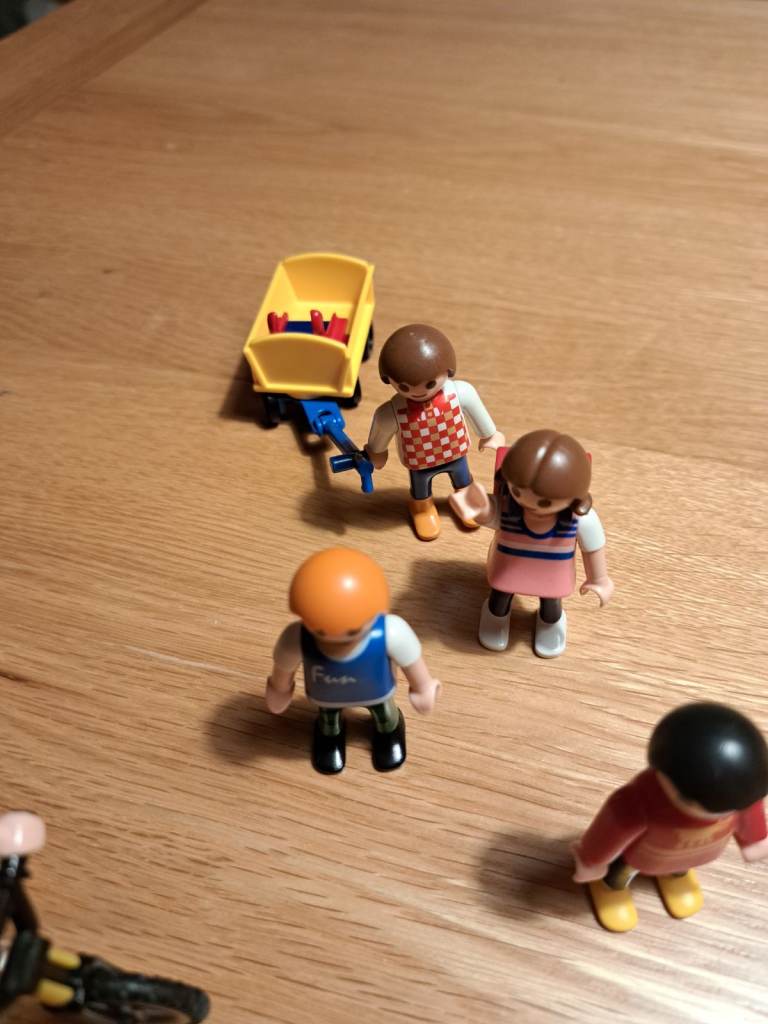 Sets of playmobil kids and adults