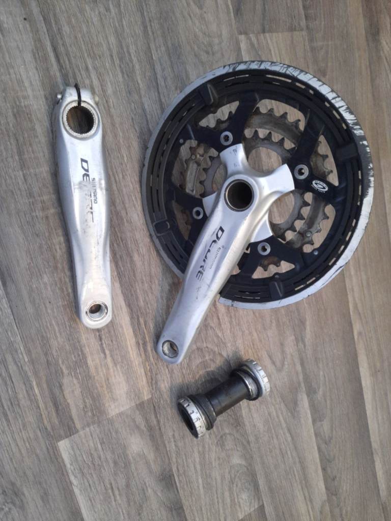 Shimano crankset and bottom bracket. Bicycle crank, tripple, double or single ring.