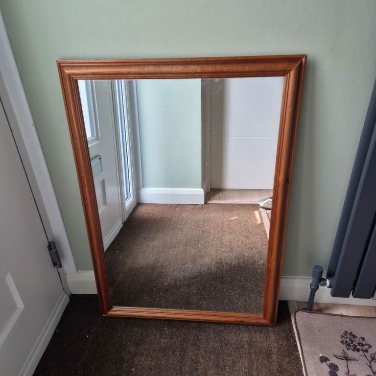 Mirror with wood frame