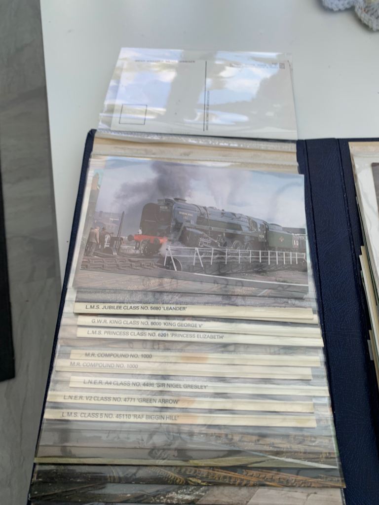 Vintage train album of 40 unused postcards 