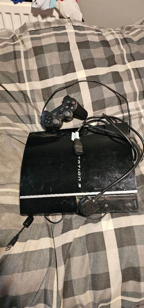 Ps3 with controller and games 