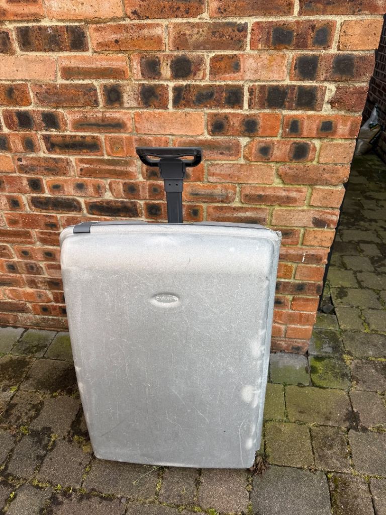 Carlton (like Samsonite)Hard shell suitcase with wheels and combination lock 