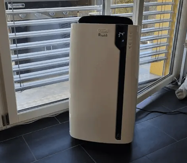 De'Longhi Pinguino PACEX100 Silent Portable Air Conditioner with remote control
