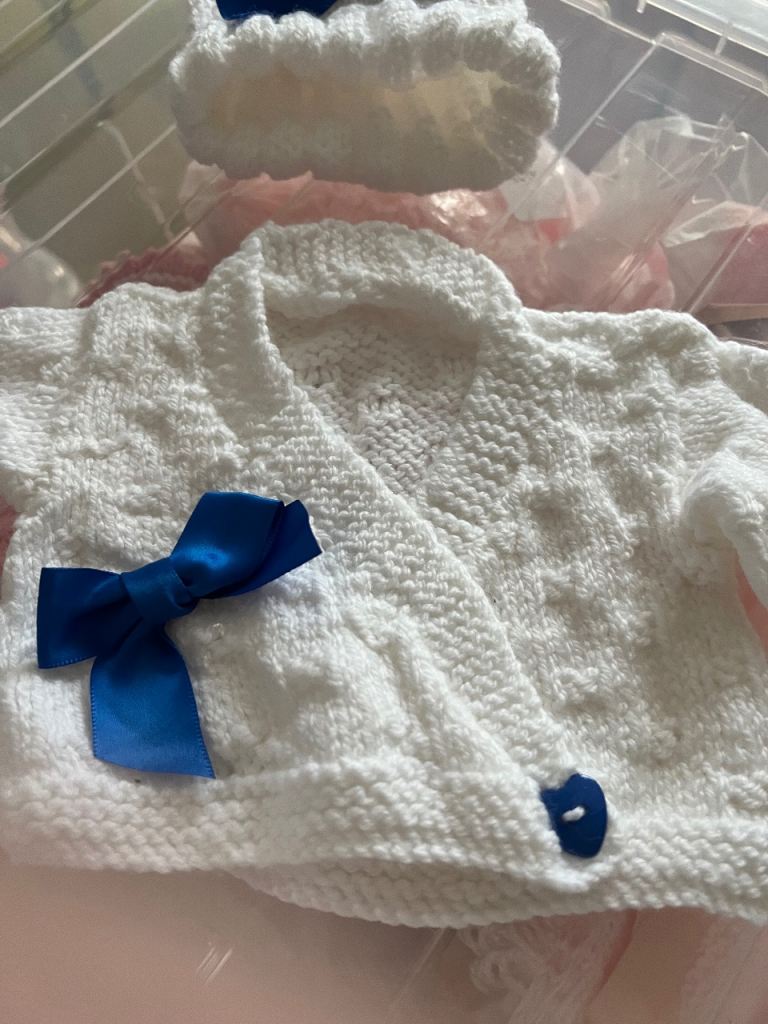 Newborn Knitted Cardigan and Hat Set with Blue Bows