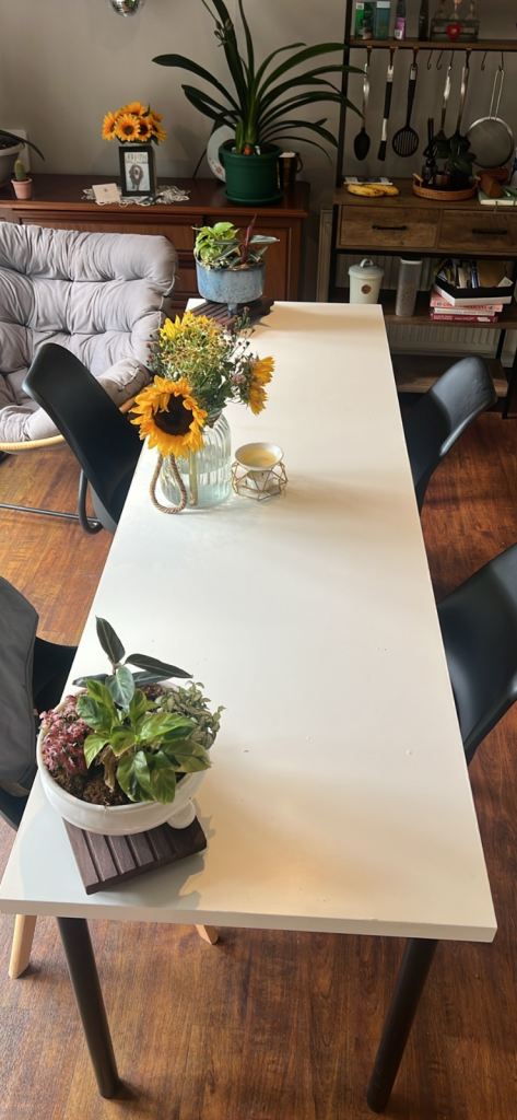 White Top Dining Table with 4 Black Chairs